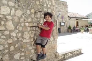 My son Stefano climbing the walls of Santo Stefano