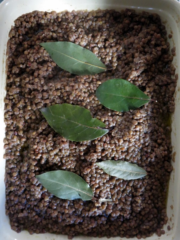 A cup of oil may seem liek a lot buit the oil marinates the lentils and prevents them from clumping and drying out.  They bay leaves impart a mild, sweet aroma.